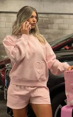 Baby Pink Oversized Heart Embossed Runner Shorts