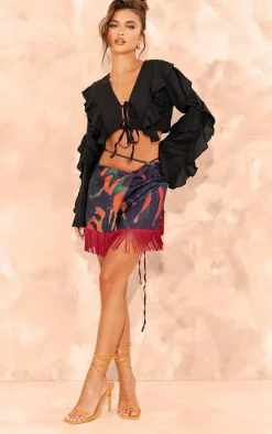 Black Leaf Print Tassel Hem Wrap Mini Skirt