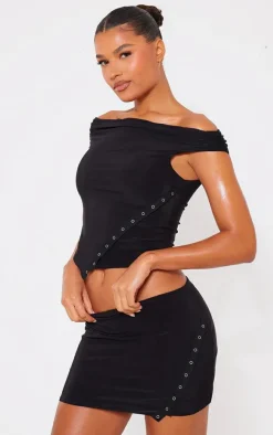 Black Slinky Low Rise Slit Hem Eyelet Detail Micro Mini Skirt