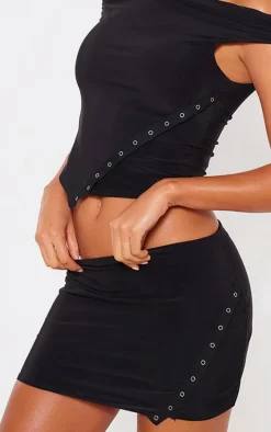 Black Slinky Low Rise Slit Hem Eyelet Detail Micro Mini Skirt