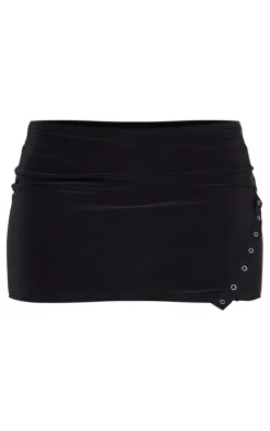 Black Slinky Low Rise Slit Hem Eyelet Detail Micro Mini Skirt