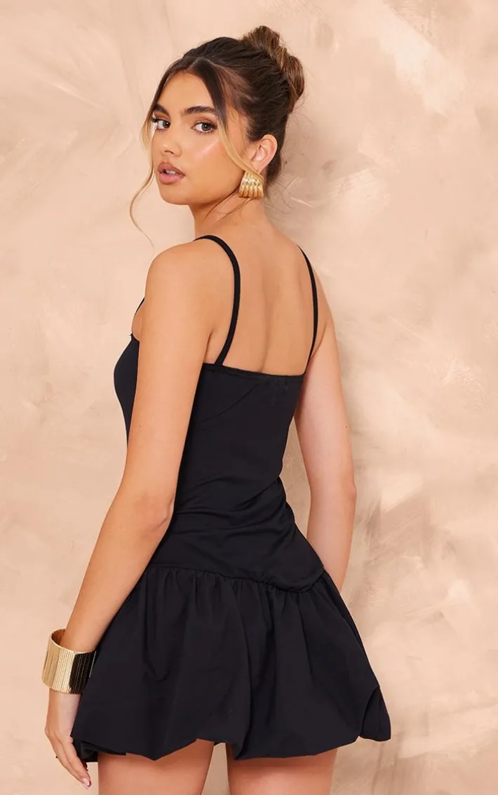 Black Strappy V Dip Waist Puffball Mini Dress