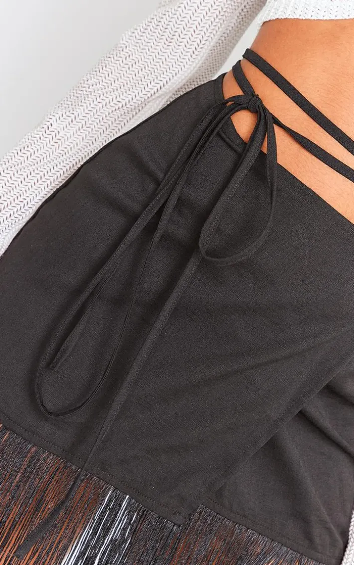 Black Tassel Hem Wrap Mini Skirt