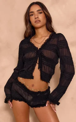 Black Textured Woven Frill Hot Pants