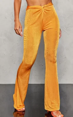 Bright Orange Slinky Acetate Twist Front Flares