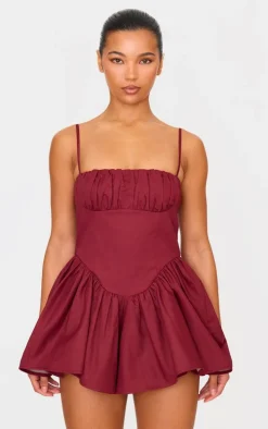 Burgundy Woven Dipped Waist Strappy Romper