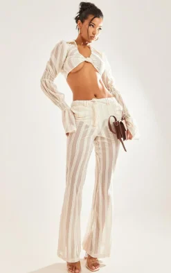 Cream Textured Woven Flare Pants