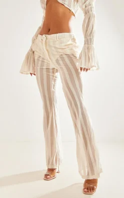 Cream Textured Woven Flare Pants