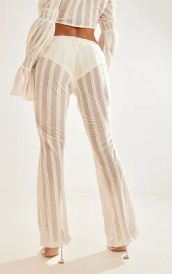 Cream Textured Woven Flare Pants