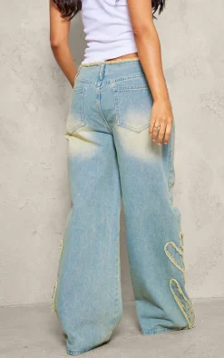 Petite Vintage Bleach Wash Mid Rise Embroidered Wide Leg Jeans