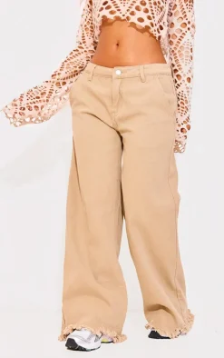 Petite Washed Stone Baggy Raw Hem Low Rise Wide Leg Jean