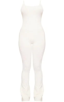 PLT SPORT Bone Seamless Laser Cut Strappy Gym Flare Unitard