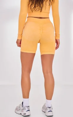 PLT SPORT Mustard Acid Wash Seamless Rib Ruched Bum Booty Shorts