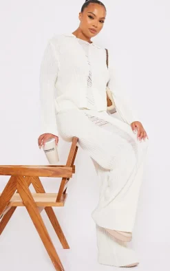 Plus Cream Distressed Knitted Leggings