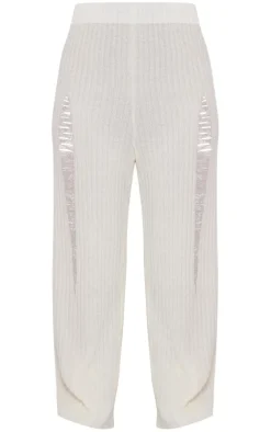 Plus Cream Distressed Knitted Leggings