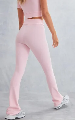 PRETTYLITTLETHING Baby Pink Sport Metal Badge Sculpt High Waist Flare Pants