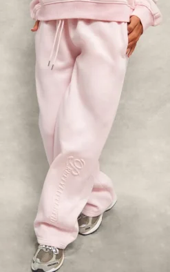 PRETTYLITTLETHING Baby Pink Embossed Graphic Straight Leg Sweatpant