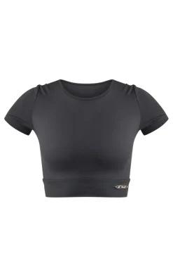 PRETTYLITTLETHING Black Sport Metal Badge Sculpt Short Sleeve Crop Top