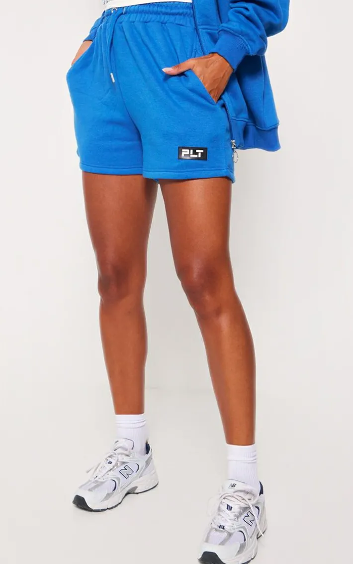 PRETTYLITTLETHING Blue Badge Oversized Runner Shorts