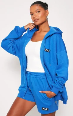 PRETTYLITTLETHING Blue Badge Oversized Runner Shorts