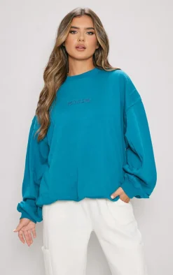 PRETTYLITTLETHING Blue Embroidered Gathered Hem Sweatshirt