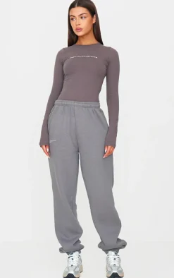 PRETTYLITTLETHING Charcoal Logo Print Long Sleeve Bodysuit