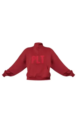PRETTYLITTLETHING Dark Red Borg Applique Quarter Zip Sweatshirt