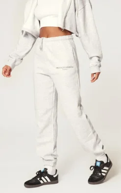 PRETTYLITTLETHING Grey Marl Copy right Graphic Sweatpants