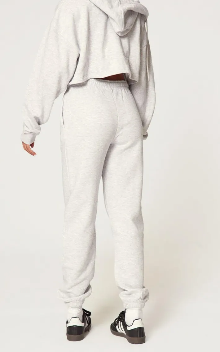PRETTYLITTLETHING Grey Marl Copy right Graphic Sweatpants