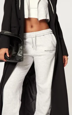 PRETTYLITTLETHING Grey Marl Copy right Graphic Sweatpants