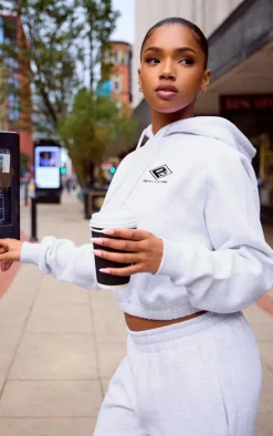 PRETTYLITTLETHING Grey Marl Embroidered Cinched Waist Cropped Hoodie