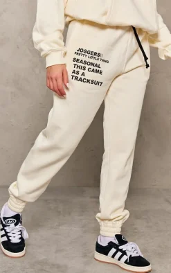 PRETTYLITTLETHING Logo Cream Graphic Print Sweatpants