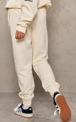 PRETTYLITTLETHING Logo Cream Graphic Print Sweatpants