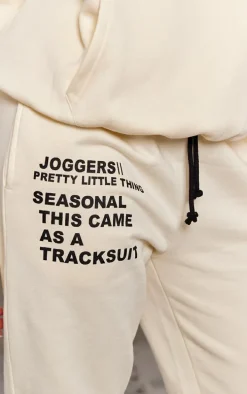 PRETTYLITTLETHING Logo Cream Graphic Print Sweatpants