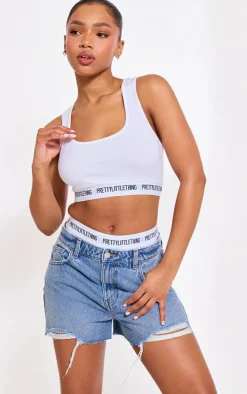 PRETTYLITTLETHING Mid Blue Wash Distressed High Rise Mom Denim Shorts