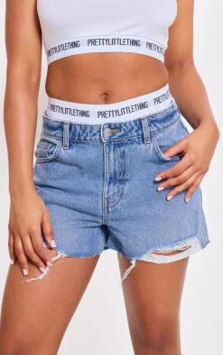 PRETTYLITTLETHING Mid Blue Wash Distressed High Rise Mom Denim Shorts