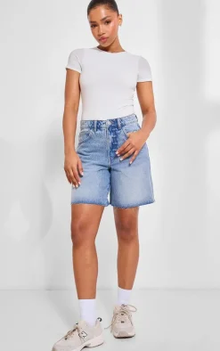 PRETTYLITTLETHING Mid Blue Wash Raw Hem Longline Loose Fit Denim Shorts