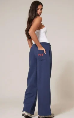PRETTYLITTLETHING Navy Printed Back Pocket Wide Leg Sweatpants