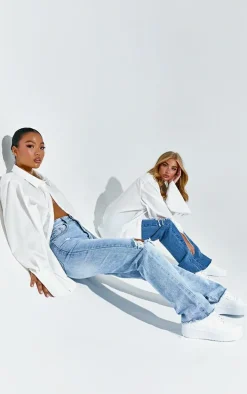 PRETTYLITTLETHING Petite Light Blue Wash Ripped Long Leg Straight Jeans