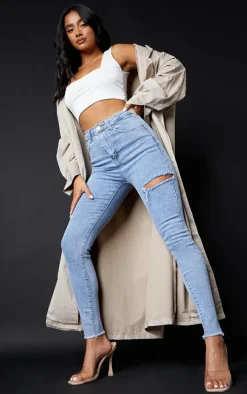 PRETTYLITTLETHING Petite Vintage Wash Thigh Rip Raw Hem 5 Pocket Skinny Jeans