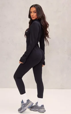 PRETTYLITTLETHING Petite Black Embroidered Zip Front Catsuit