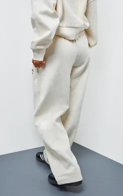PRETTYLITTLETHING Petite Cream Premium Print Wide Leg Sweatpants