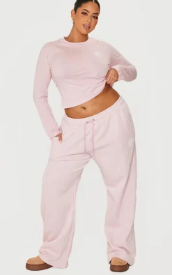 PRETTYLITTLETHING Plus Baby Pink Printed Wide Leg Sweatpants