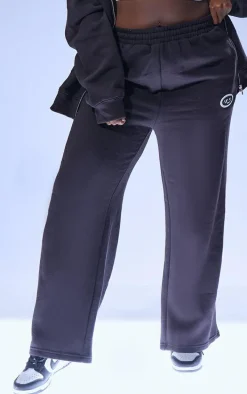 PRETTYLITTLETHING Plus Black Logo Badge Wide Leg Sweatpants