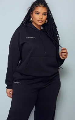 PRETTYLITTLETHING Plus Black Est 2012 Printed Oversized Hoodie