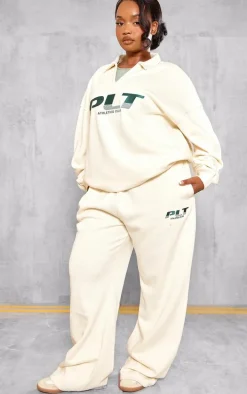 PRETTYLITTLETHING Plus Cream Athletics Club Embroidered Wide Leg Sweatpants