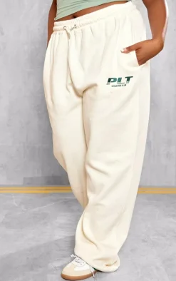 PRETTYLITTLETHING Plus Cream Athletics Club Embroidered Wide Leg Sweatpants