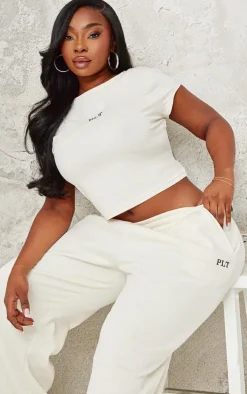 PRETTYLITTLETHING Plus Cream Contrast Embroidery Fitted Cap Sleeve T Shirt