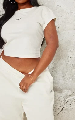 PRETTYLITTLETHING Plus Cream Contrast Embroidery Fitted Cap Sleeve T Shirt