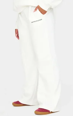 PRETTYLITTLETHING Plus Cream Contrast Print Wide Leg Sweatpants